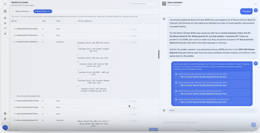 Valzo Model Co-Create onboarding screen showing a cost drivers metrics table with the Valzo Assistant chat asking how to wire bill-of-materials inputs into the Bench Grinder material cost, with four suggested wiring options